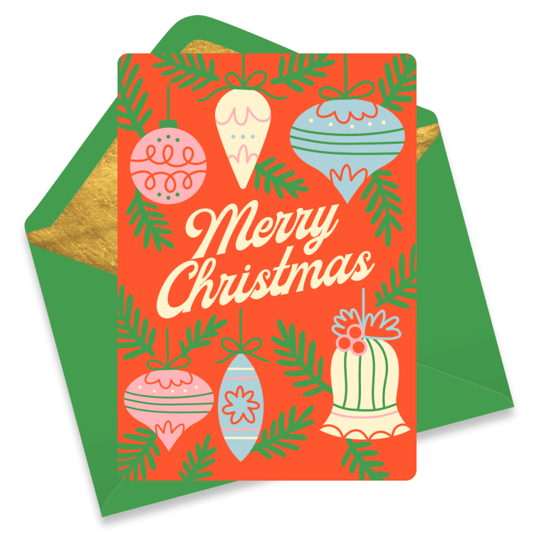 A Christmas card with vintage ornaments and greenery reading 'Merry Christmas'.